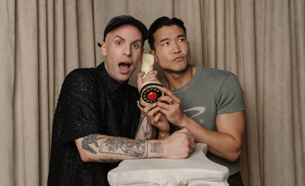 Joel Kim Booster and  Katya ZamolodchikovaAmerican drag queen
for the Grindr 'Who's The A**hole' podcast